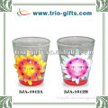 clear shot glass with polyresin decor